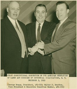 George Meany, Walter Reuther greeted by William Belanger